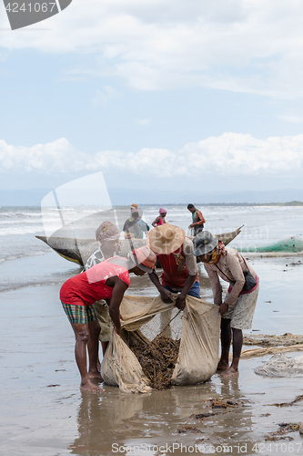 Image of Native Malagasy fishermen fishing on sea, Madagascar