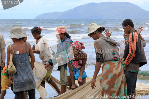 Image of Native Malagasy fishermen fishing on sea, Madagascar