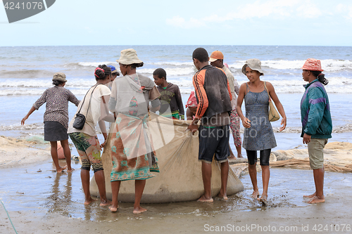 Image of Native Malagasy fishermen fishing on sea, Madagascar