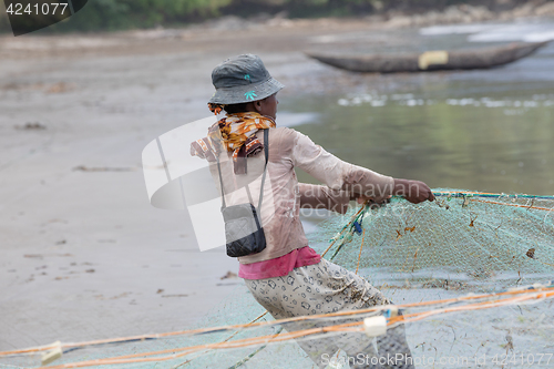 Image of Native Malagasy fishermen fishing on sea, Madagascar