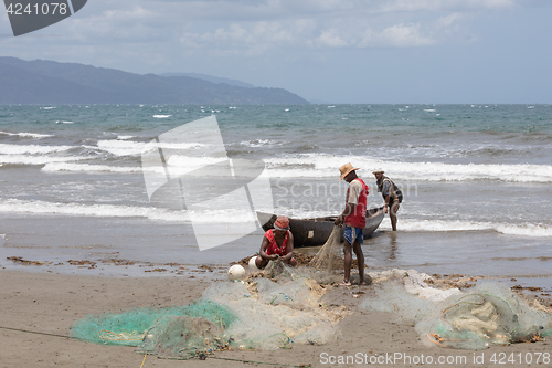 Image of Native Malagasy fishermen fishing on sea, Madagascar