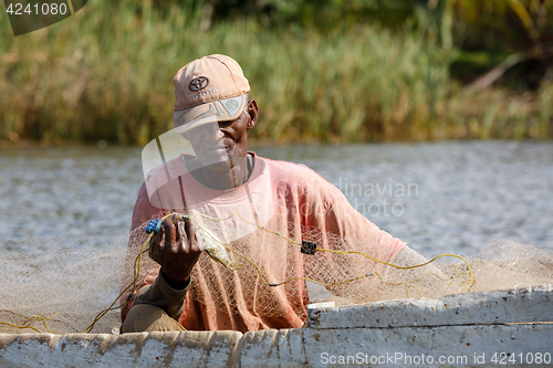 Image of Fisherman life in madagascar countryside on river