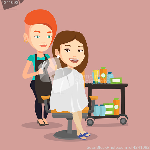 Image of Hairdresser making haircut to young woman.