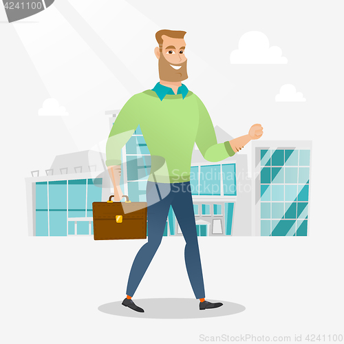 Image of Successful businessman walking in the city.
