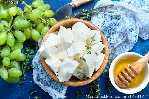 Image of cheese with grape