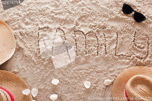 Image of Family in a sandy tropical beach