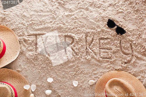 Image of Turkey in a sandy tropical beach