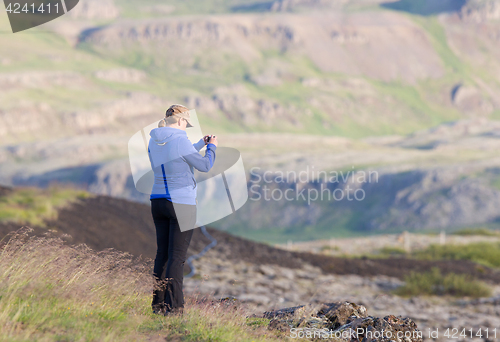 Image of Shot of a young woman hiking in Iceland