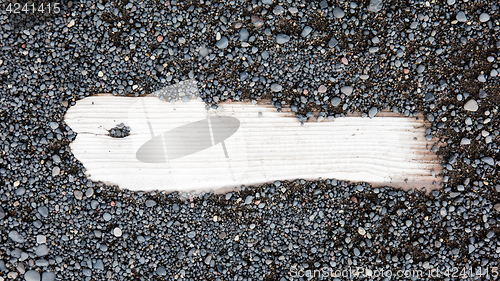 Image of Sand on planked wood