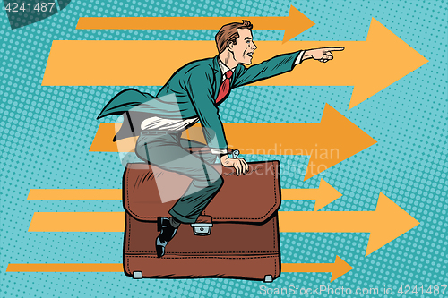 Image of businessman flying on a leather business briefcase