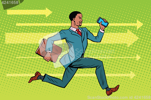 Image of Businessman with a smartphone running fast forward