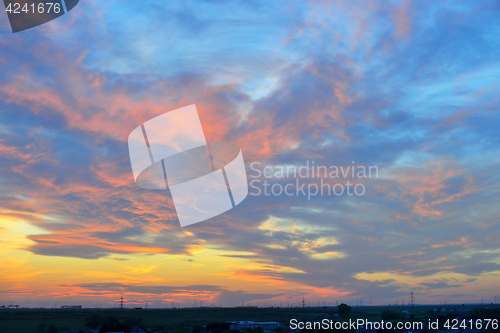 Image of Dramatic sunset over city