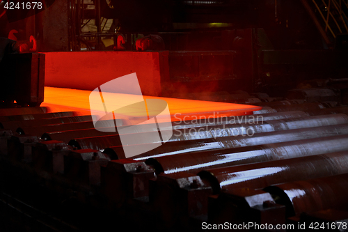 Image of Hot steel plate on conveyor