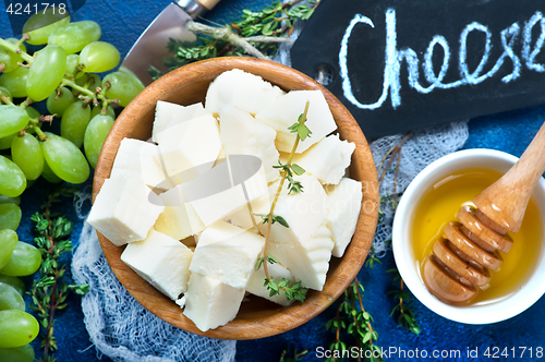 Image of cheese with grape