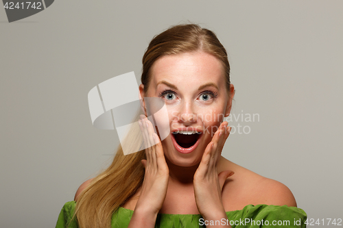 Image of Photo of girl in sweater