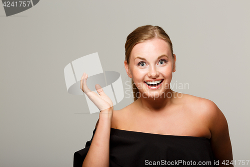 Image of Smiling model with bare shoulders