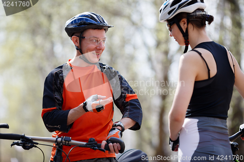 Image of Portrait of athletes with bicycles