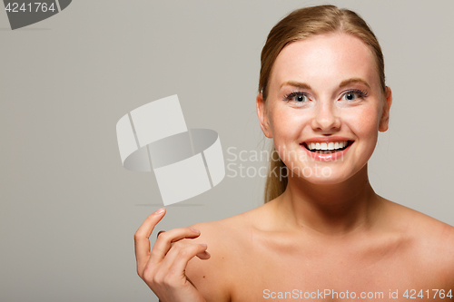 Image of Beautiful girl on gray background