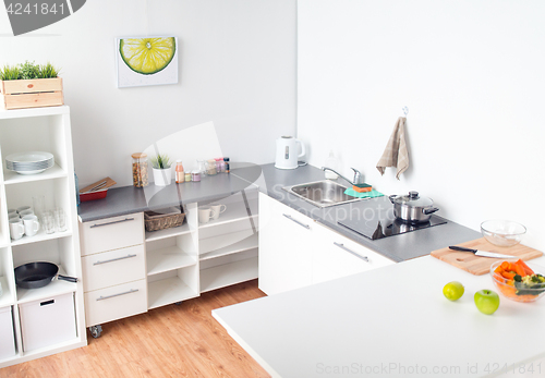 Image of modern home kitchen interior with food on table