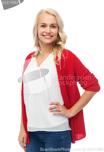 Image of happy smiling young woman in red cardigan