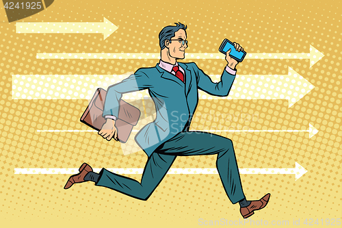 Image of Businessman with a smartphone running fast forward