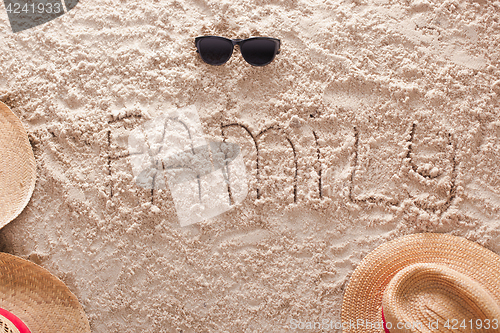 Image of Family in a sandy tropical beach