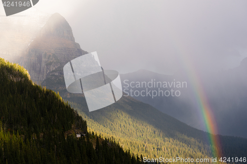 Image of Rainbow Fall Color Rocky Mountains Glacier National Park Montana