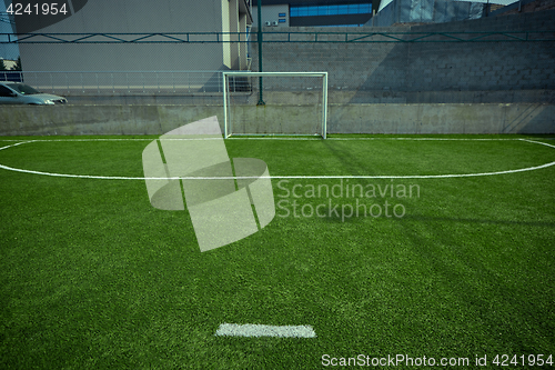 Image of The empty football field and green grass