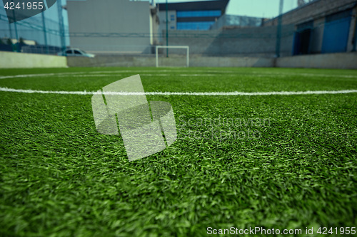 Image of The empty football field and green grass