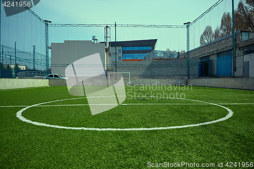 Image of The empty football field and green grass