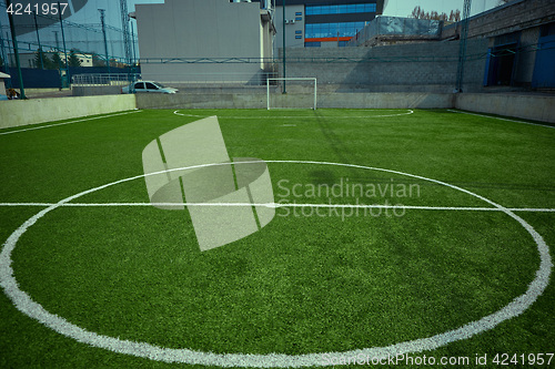 Image of The empty football field and green grass