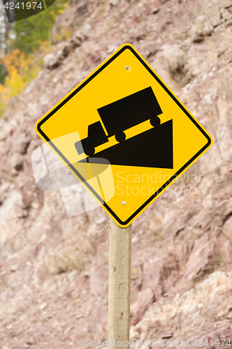 Image of Yellow Square Road Sign Warning Steep Decline Ahead