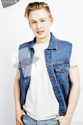 Image of young handsome teenage hipster guy posing emotional, happy smiling against white background isolated, lifestyle people concept closeup