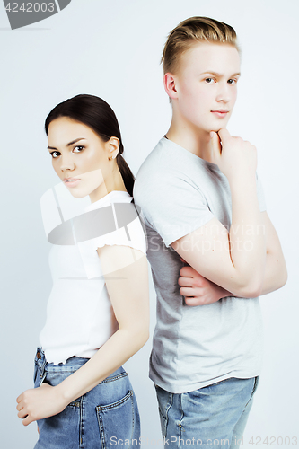 Image of best friends teenage asian girl and boy together having fun, posing emotional on white background, couple happy smiling, lifestyle people concept, blond and brunette multi nations 