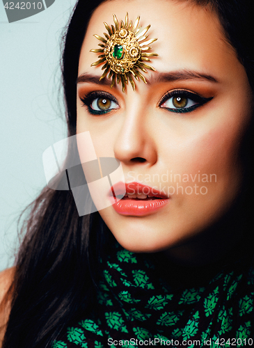 Image of beauty eastern real muslim woman with jewelry close up, bride wi