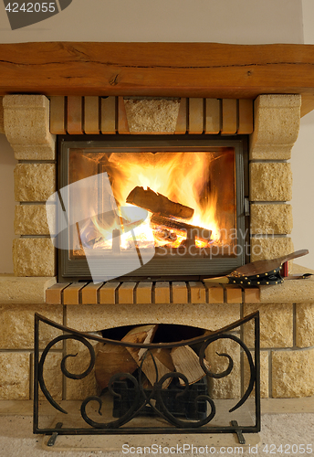 Image of Roaring flames in modern fireplace