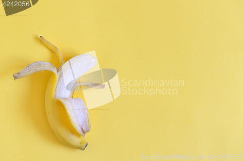 Image of Ripe banana on yellow background
