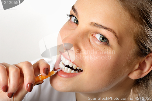 Image of Girl using Interdental Brush