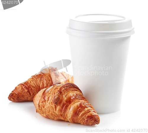 Image of paper cup of coffee and croissants