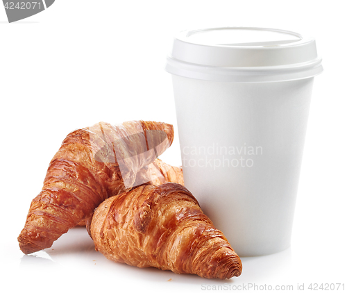 Image of paper cup of coffee and croissants