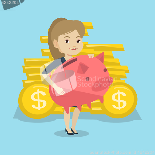 Image of Business woman holding big piggy bank.