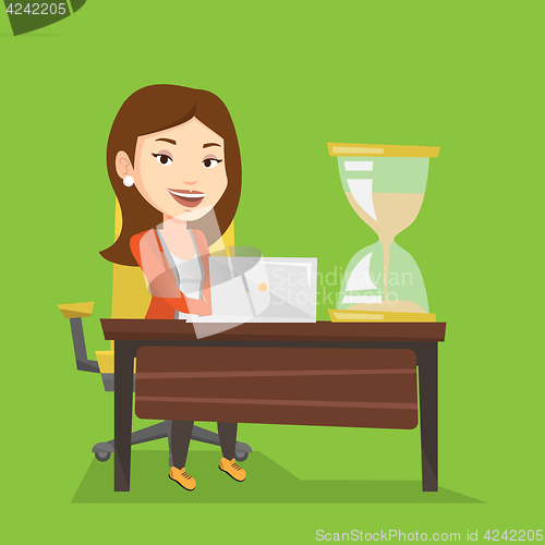 Image of Business woman working in office.