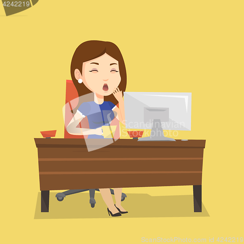 Image of Tired employee working in office.