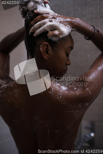 Image of African American woman in the shower