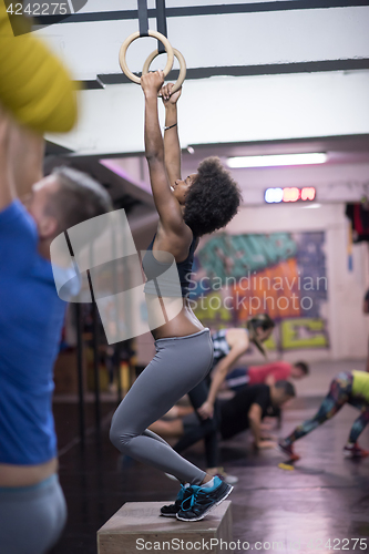 Image of black woman doing dipping exercise