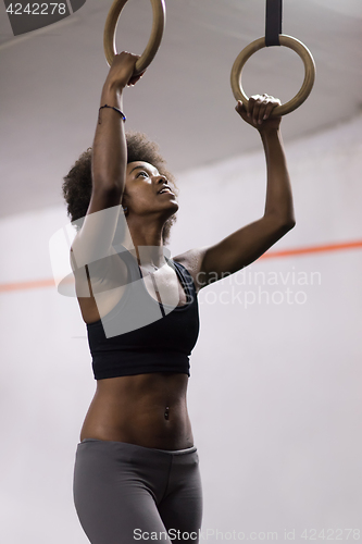 Image of black woman doing dipping exercise