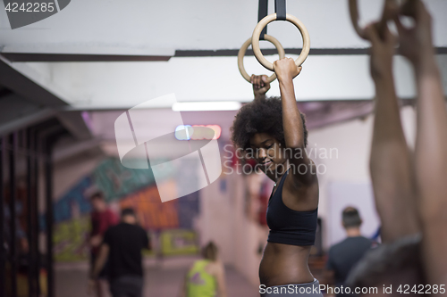 Image of black woman doing dipping exercise