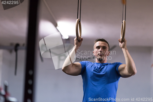 Image of man doing dipping exercise