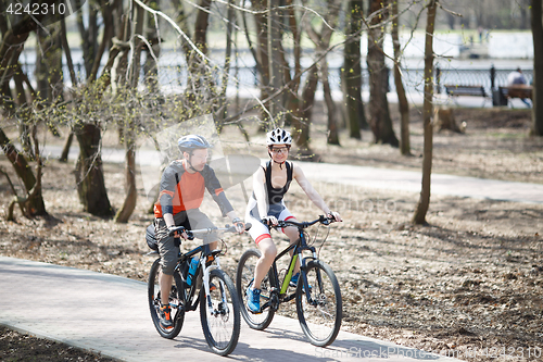 Image of Cyclists in helmet at park