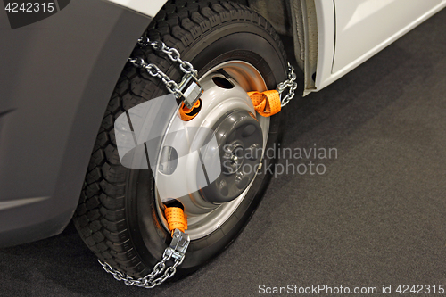 Image of Chains snow for the wheels car on black background